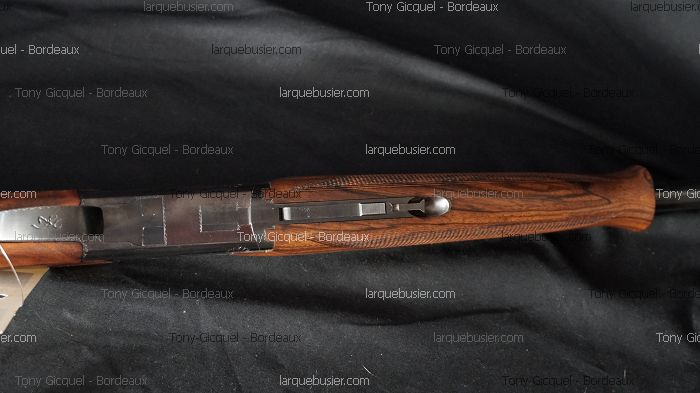 Récepteur détaillé et crosse bois d'un fusil/carabine de chasse avec levier, marqué Tony Gicquel - Bordeaux et larquebusier.com.